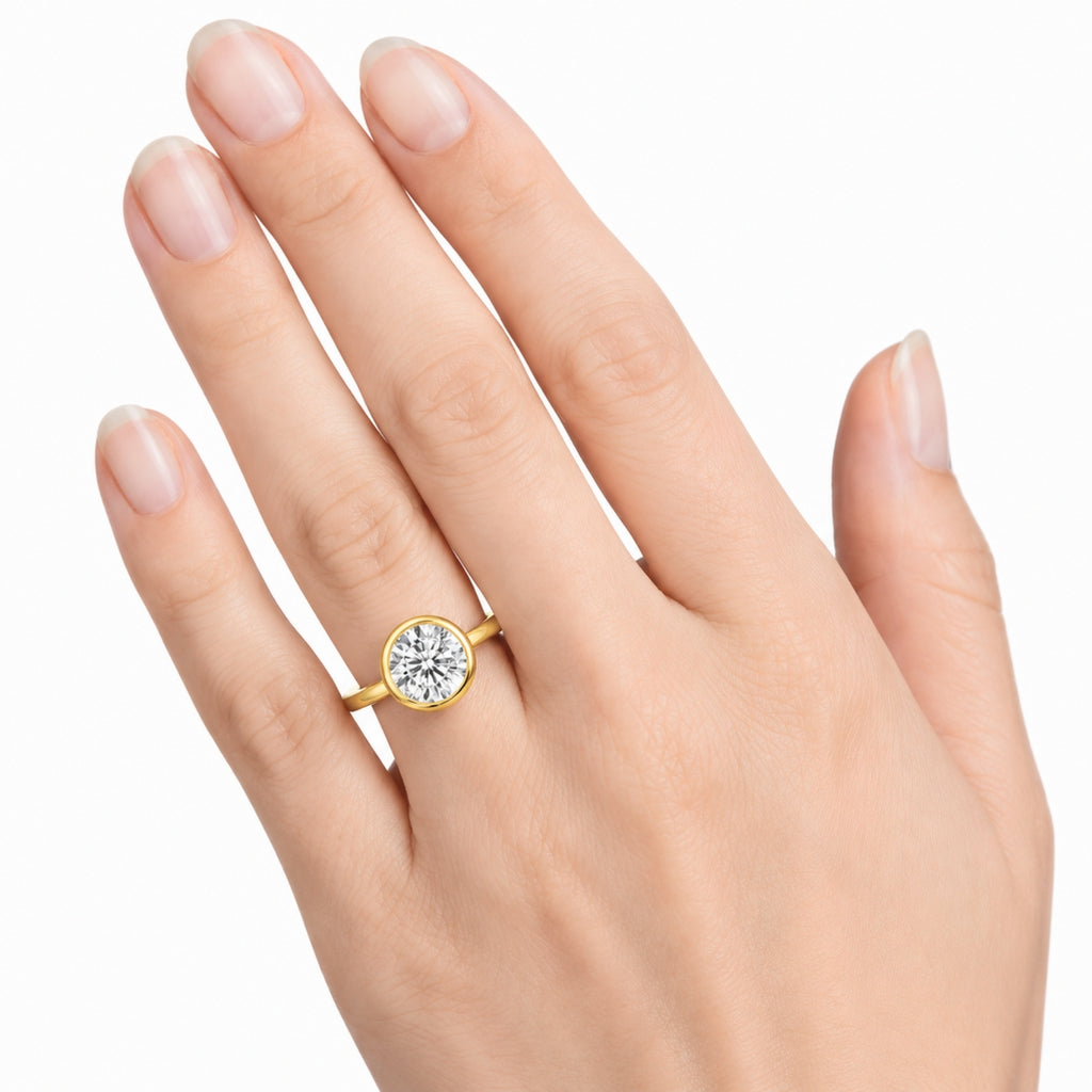 1.00-6.00 Carat T.W. Round-cut IGI Certified Lab Grown Diamond (F/VS+) 14K Gold Bezel Set Ring