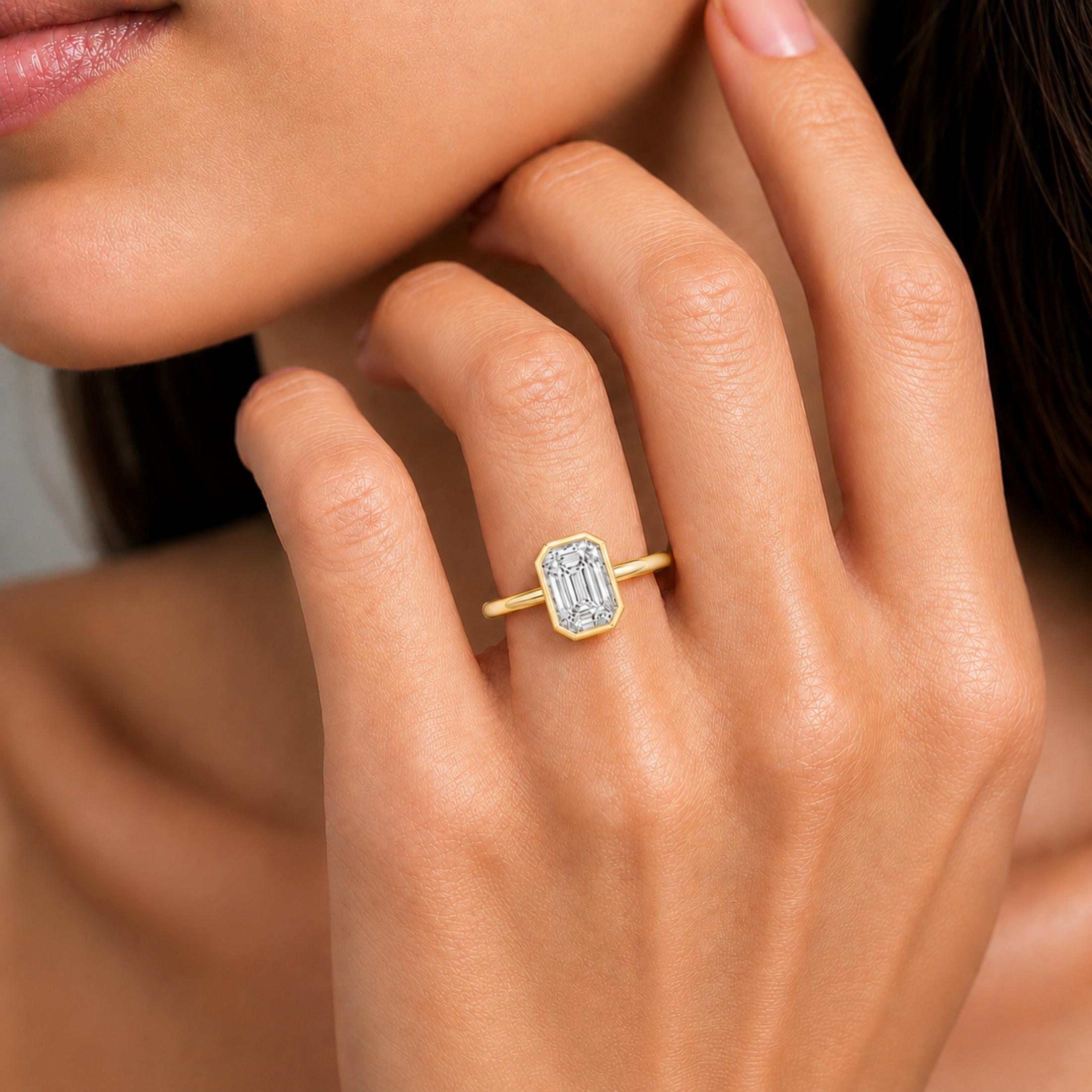 1.00-6.00 Carat T.W. Emerald-cut IGI Certified Lab Grown Diamond (F/VS+) 14K Gold Bezel Set Ring