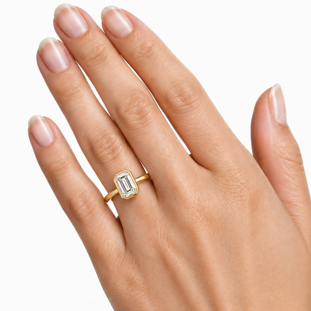 1.00-6.00 Carat T.W. Emerald-cut IGI Certified Lab Grown Diamond (F/VS+) 14K Gold Bezel Set Ring
