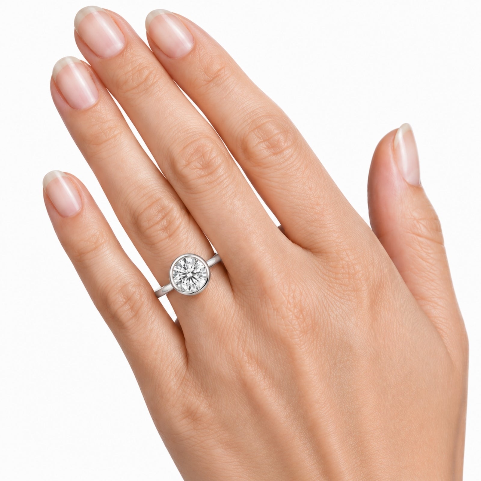 1.00-6.00 Carat T.W. Round-cut IGI Certified Lab Grown Diamond (F/VS+) 14K Gold Bezel Set Ring