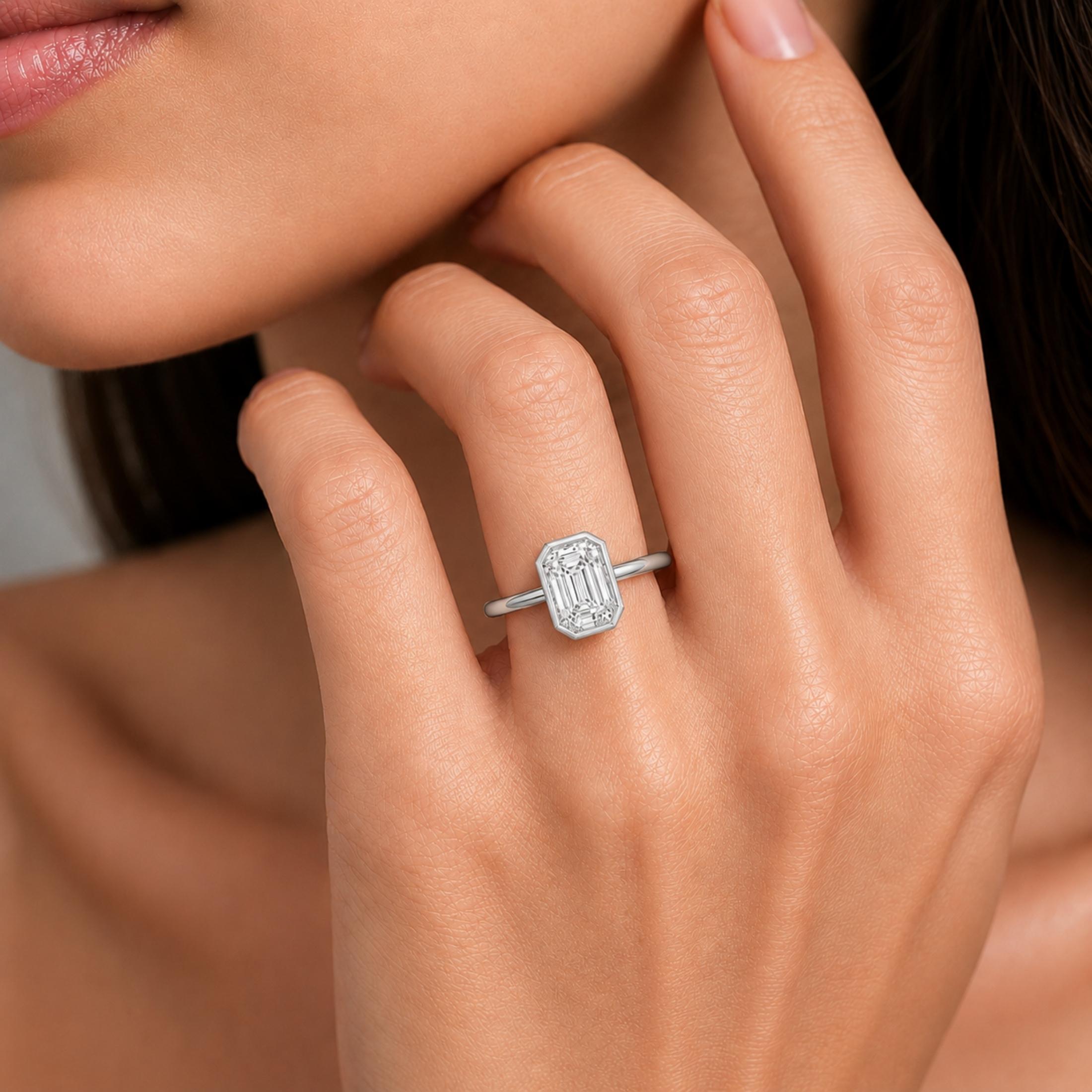 1.00-6.00 Carat T.W. Emerald-cut IGI Certified Lab Grown Diamond (F/VS+) 14K Gold Bezel Set Ring