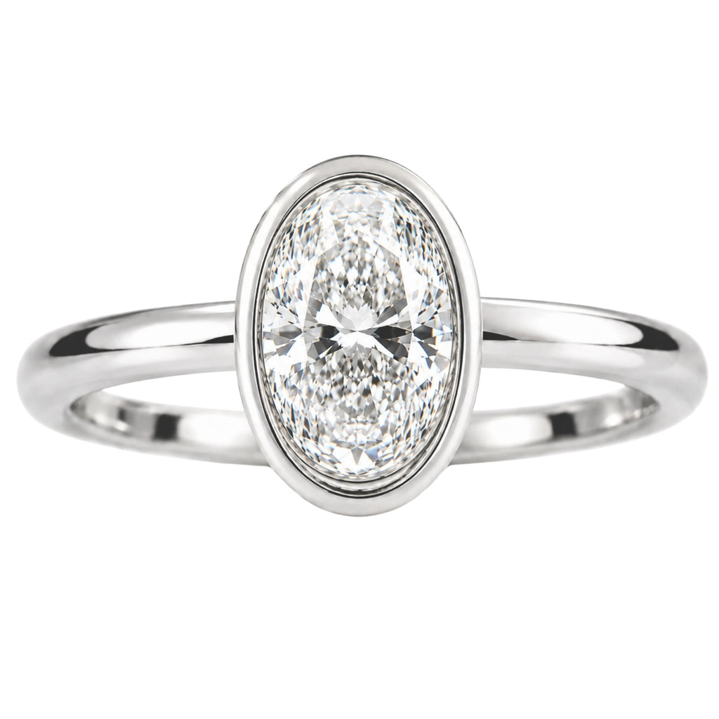 1.00-6.00 Carat T.W. Oval-cut IGI Certified Lab Grown Diamond (F/VS+) 14K Gold Bezel Set Ring