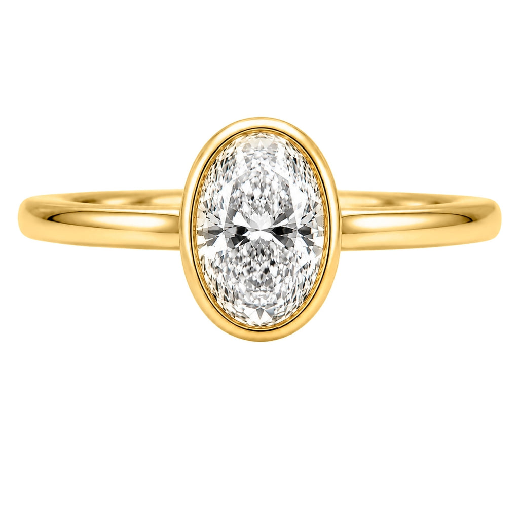 1.00-6.00 Carat T.W. Oval-cut IGI Certified Lab Grown Diamond (F/VS+) 14K Gold Bezel Set Ring