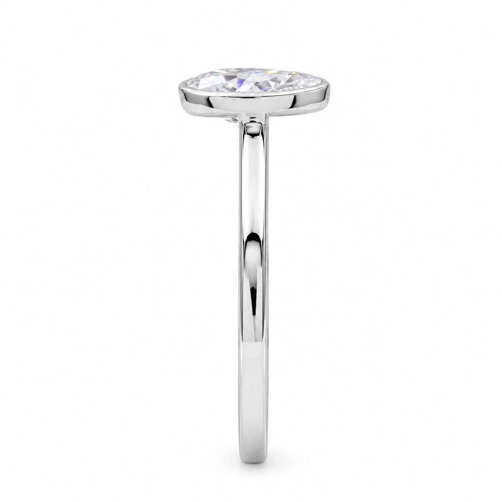 1.00-6.00 Carat T.W. Pear-cut IGI Certified Lab Grown Diamond (F/VS+) 14K Gold Bezel Set Ring