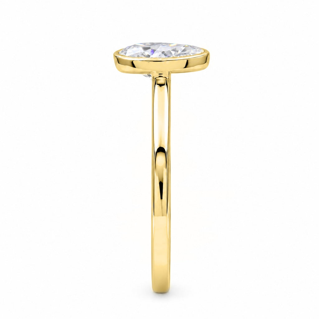 1.00-6.00 Carat T.W. Pear-cut IGI Certified Lab Grown Diamond (F/VS+) 14K Gold Bezel Set Ring