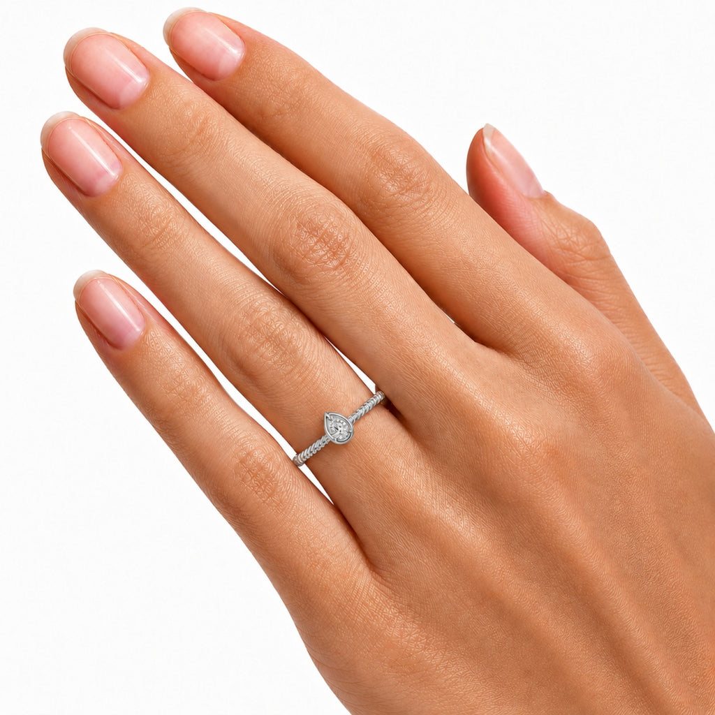 1/5 Carat T.W. Pear-cut Lab Grown Diamond (F/VS+) 14K Gold Ring