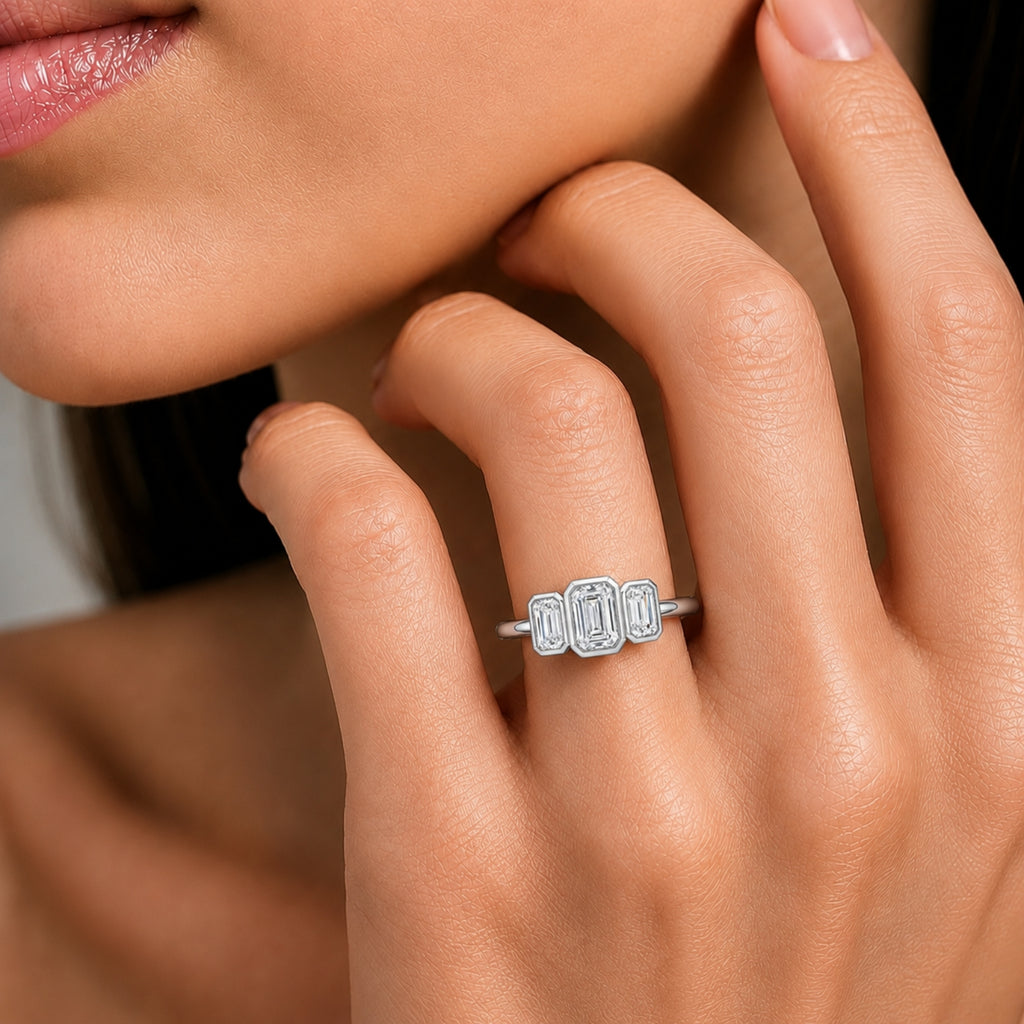 2.50 Carat T.W. Emerald-cut Lab Grown Diamond (F/VS+) 14K Gold Bezel Set 3 Stone Ring