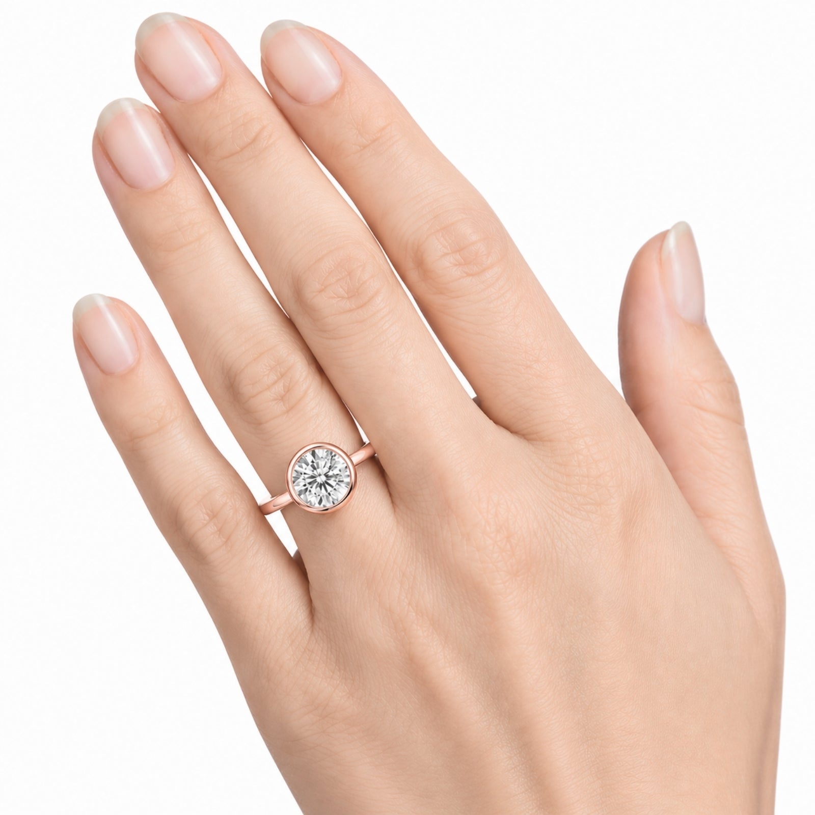 1.00-6.00 Carat T.W. Round-cut IGI Certified Lab Grown Diamond (F/VS+) 14K Gold Bezel Set Ring