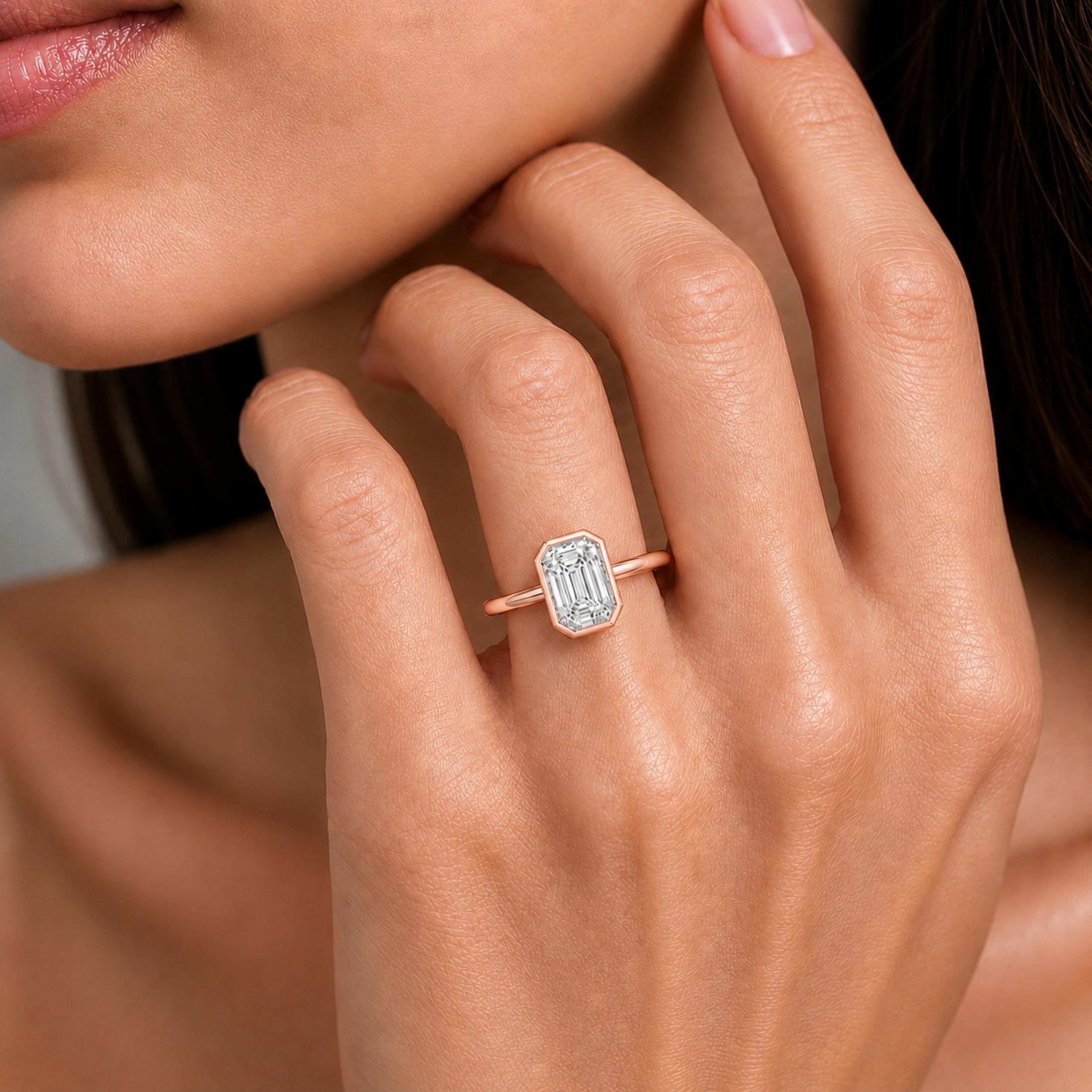 1.00-6.00 Carat T.W. Emerald-cut IGI Certified Lab Grown Diamond (F/VS+) 14K Gold Bezel Set Ring