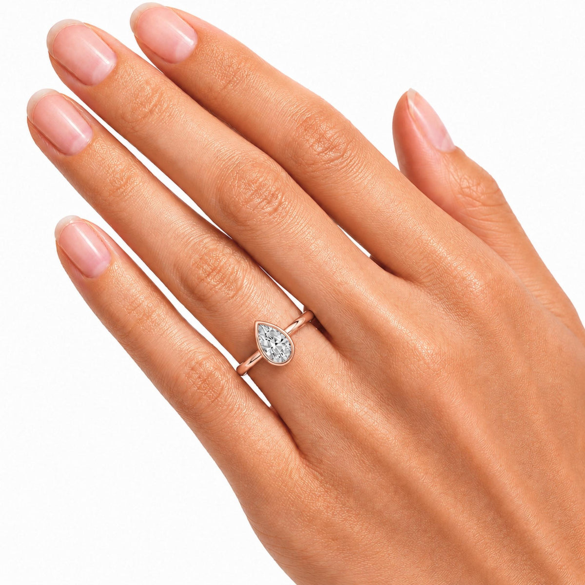1.00-6.00 Carat T.W. Pear-cut IGI Certified Lab Grown Diamond (F/VS+) 14K Gold Bezel Set Ring