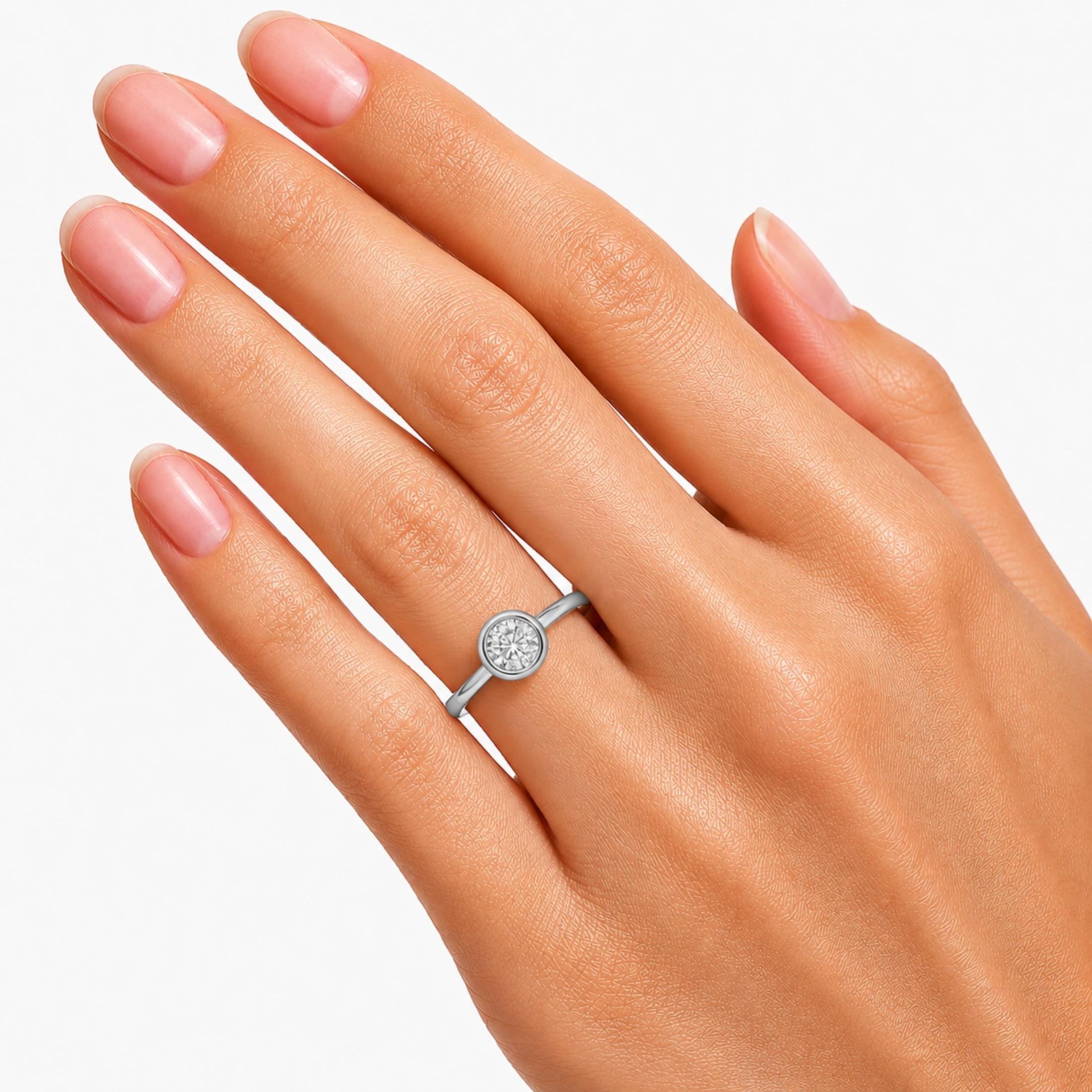 1.00-6.00 Carat T.W. Round-cut IGI Certified Lab Grown Diamond (F/VS+) 14K Gold Bezel Set Ring