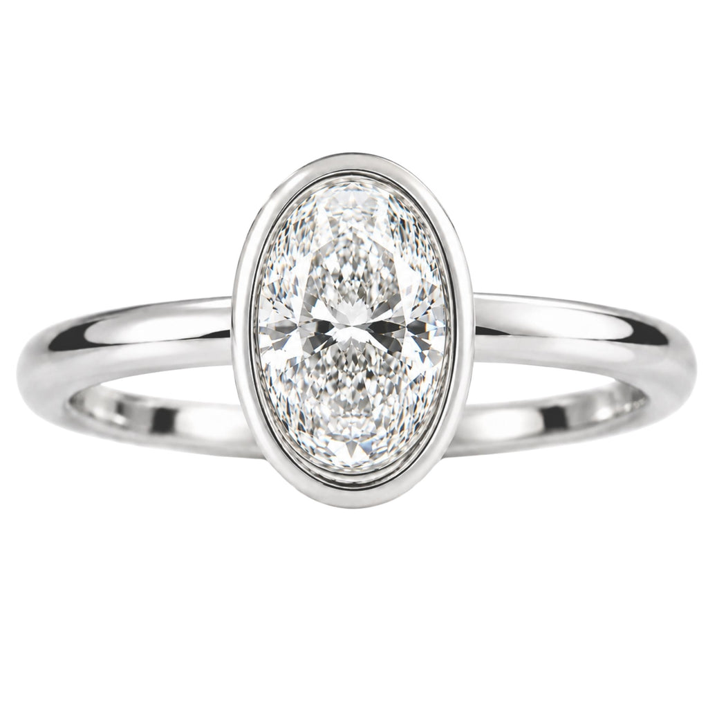 1.00-6.00 Carat T.W. Oval-cut IGI Certified Lab Grown Diamond (F/VS+) 14K Gold Bezel Set Ring