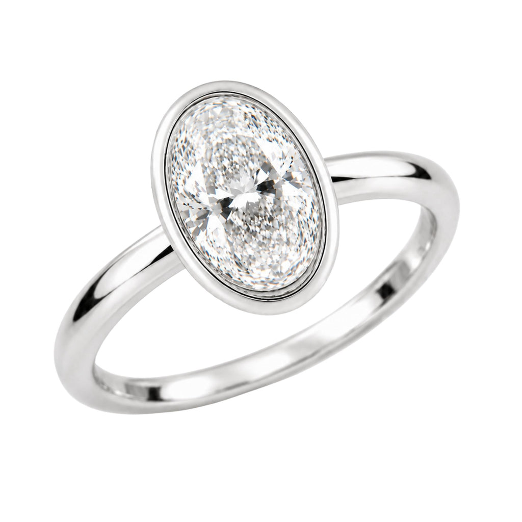 1.00-6.00 Carat T.W. Oval-cut IGI Certified Lab Grown Diamond (F/VS+) 14K Gold Bezel Set Ring