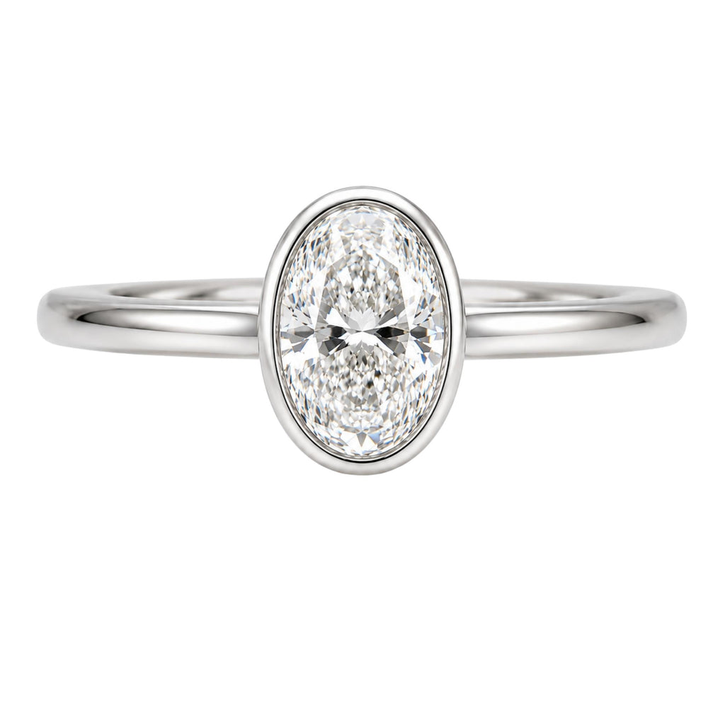 1.00-6.00 Carat T.W. Oval-cut IGI Certified Lab Grown Diamond (F/VS+) 14K Gold Bezel Set Ring