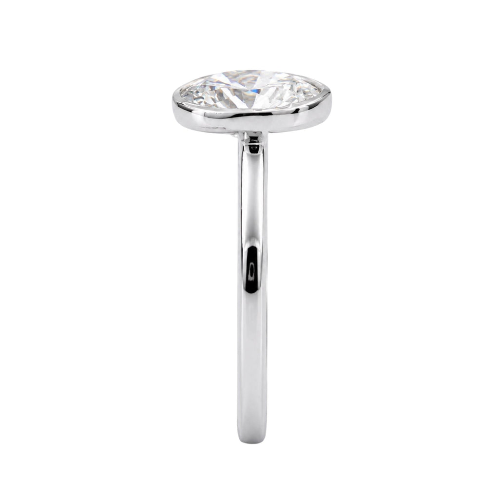 1.00-6.00 Carat T.W. Oval-cut IGI Certified Lab Grown Diamond (F/VS+) 14K Gold Bezel Set Ring