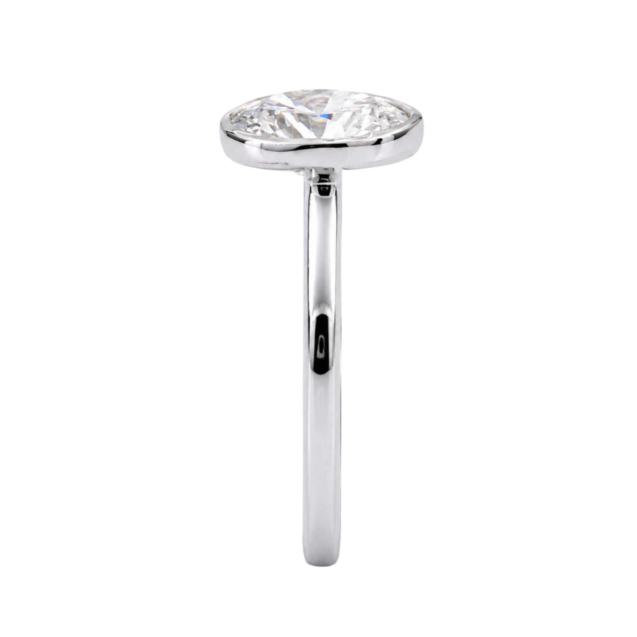 1.00-6.00 Carat T.W. Oval-cut IGI Certified Lab Grown Diamond (F/VS+) 14K Gold Bezel Set Ring