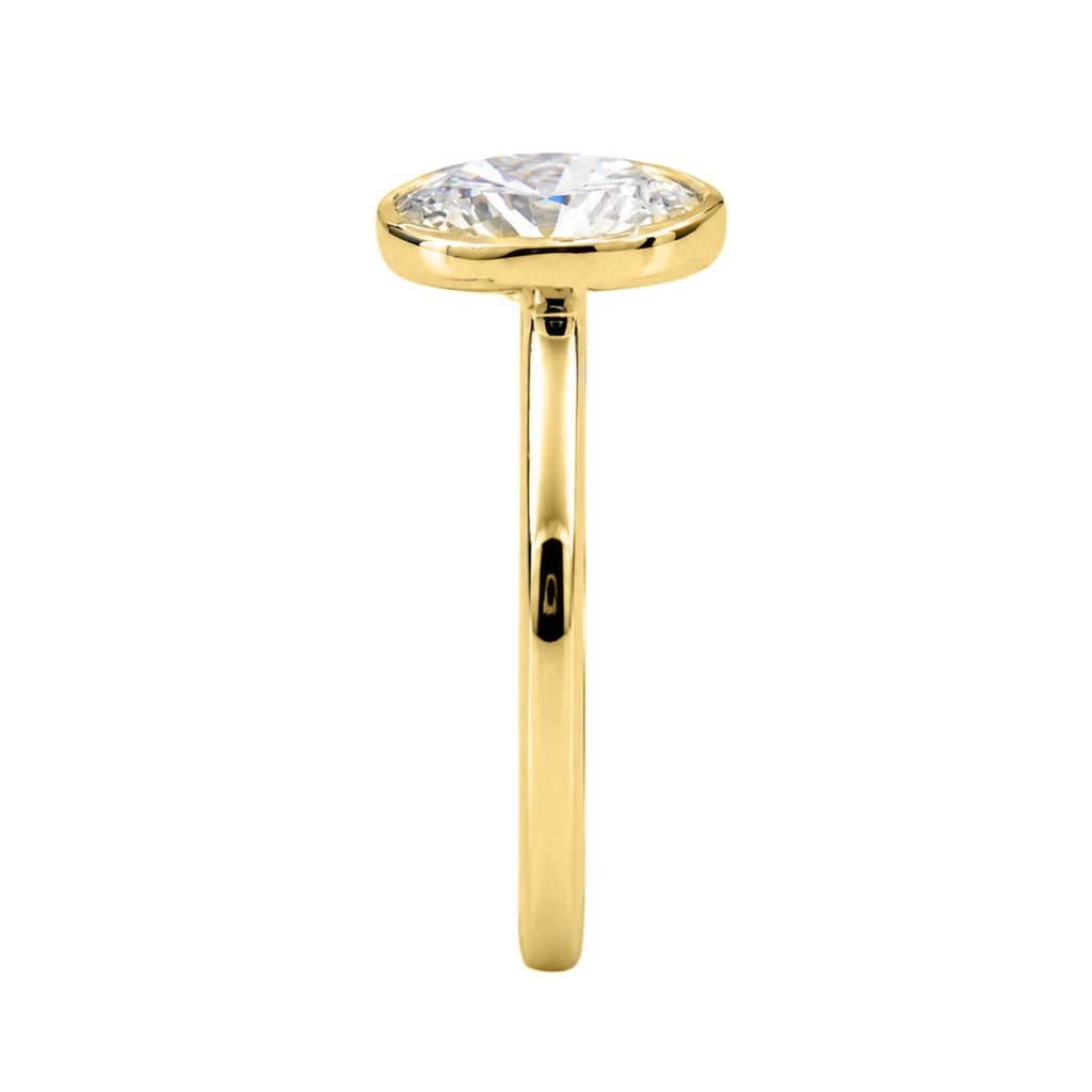 1.00-6.00 Carat T.W. Oval-cut IGI Certified Lab Grown Diamond (F/VS+) 14K Gold Bezel Set Ring