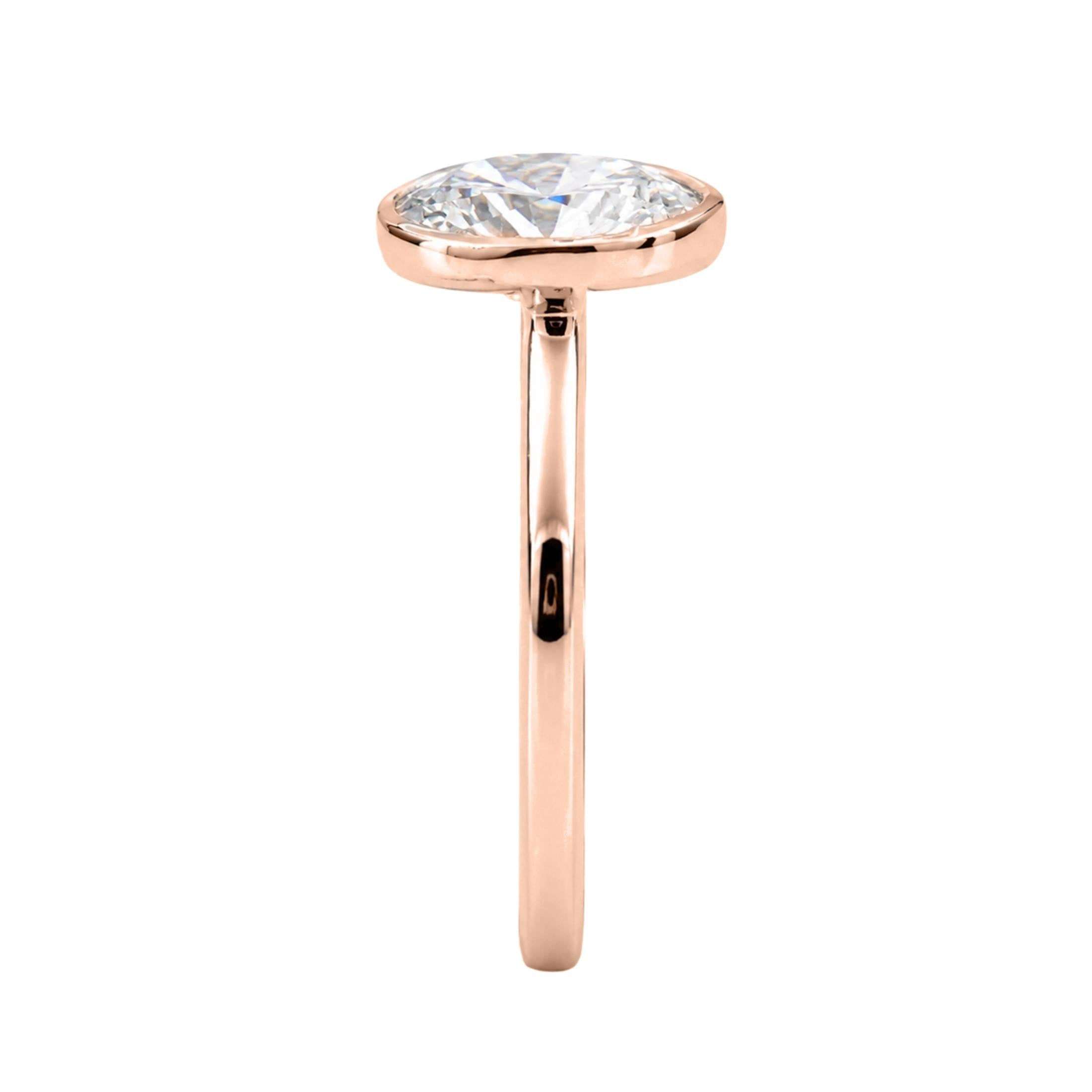 1.00-6.00 Carat T.W. Oval-cut IGI Certified Lab Grown Diamond (F/VS+) 14K Gold Bezel Set Ring