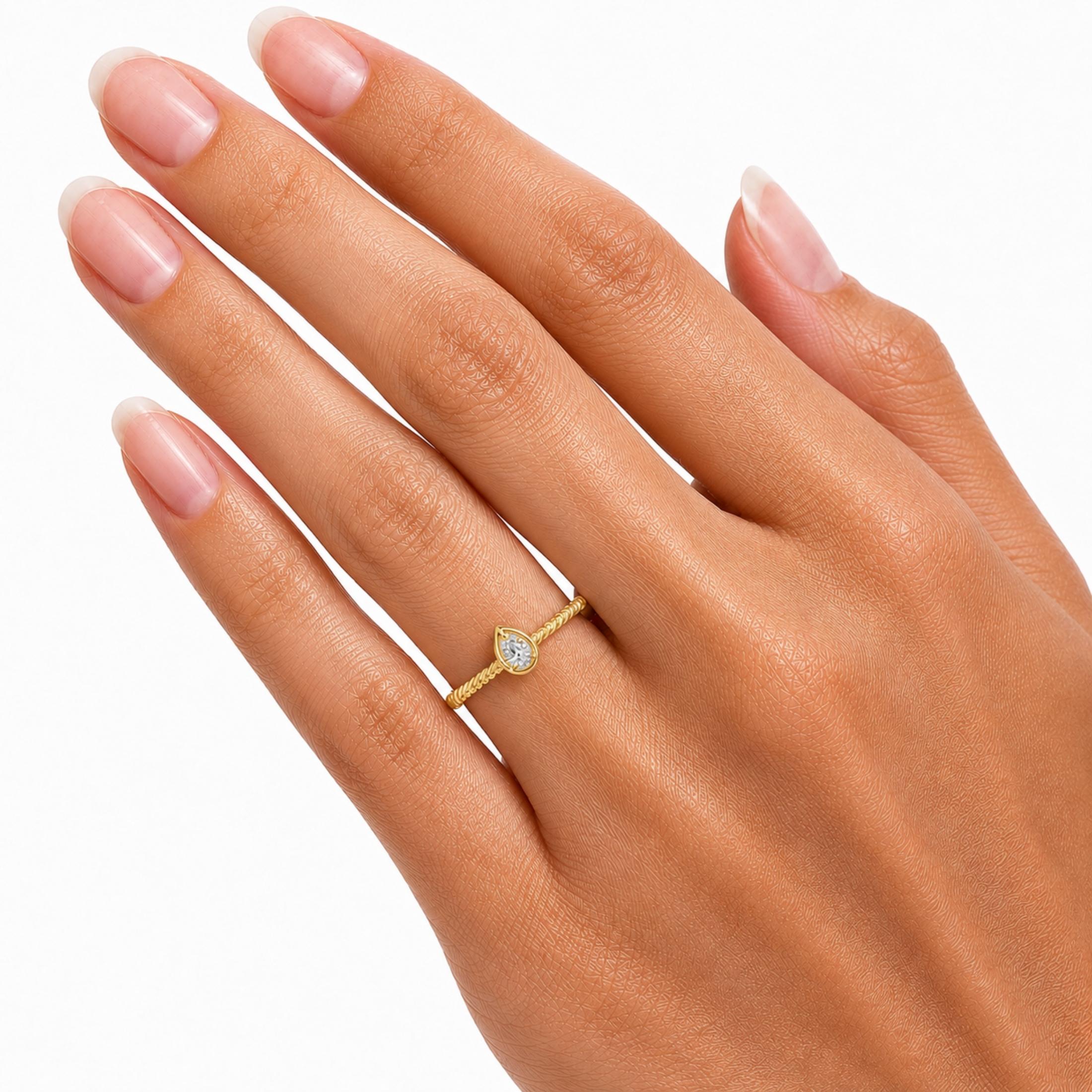 0.20 Carat T.W. Pear-cut Lab Grown Diamond (F/VS+) 14K Gold Ring