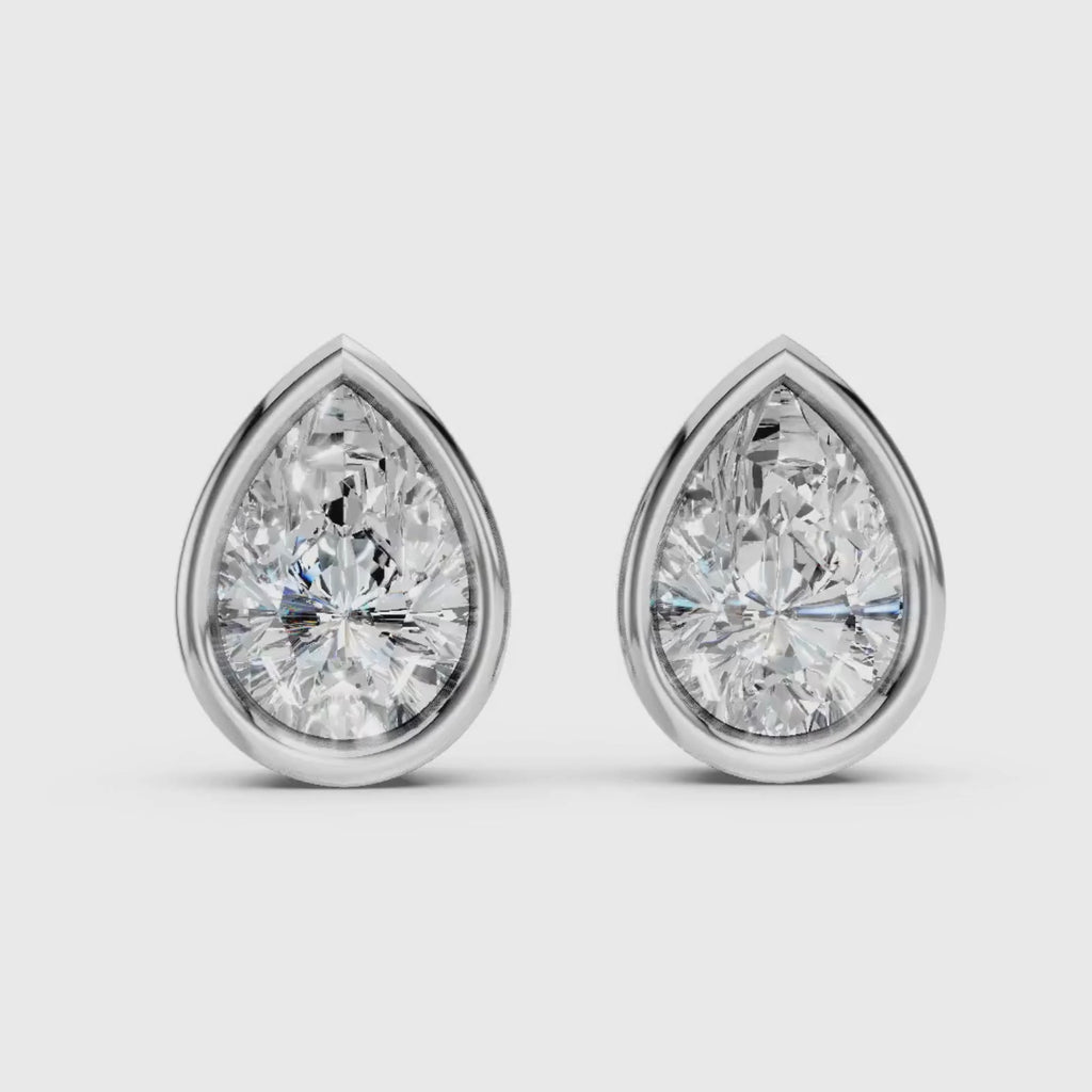1.00 - 2.00 Carat T.W. Pear-cut Lab Grown Diamond (F/VS+) 14K Gold Bezel set Stud Earrings with Double Notch Post & Pushback