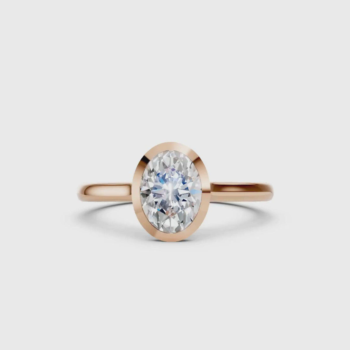 1.00-6.00 Carat T.W. Oval-cut IGI Certified Lab Grown Diamond (F/VS+) 14K Gold Bezel Set Ring