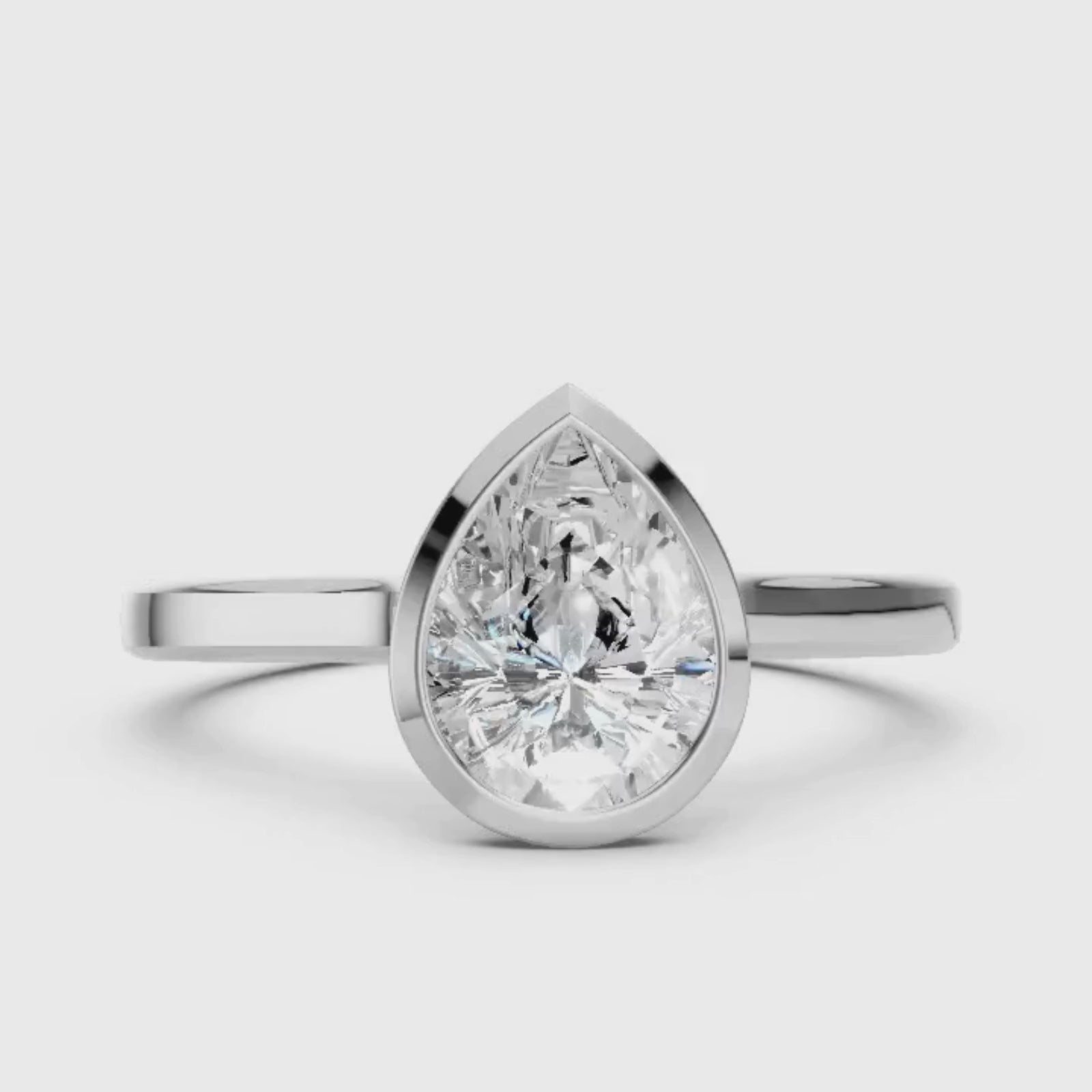 1.00-6.00 Carat T.W. Pear-cut IGI Certified Lab Grown Diamond (F/VS+) 14K Gold Bezel Set Ring
