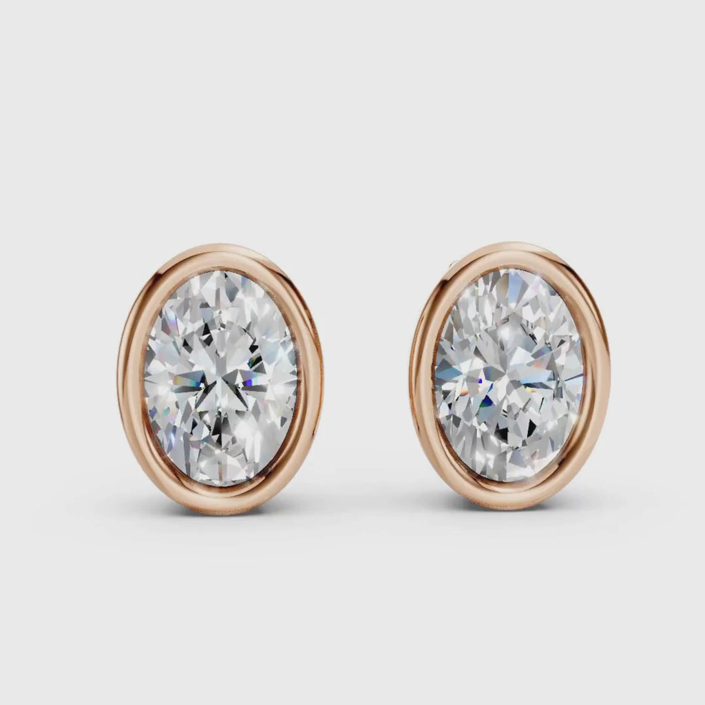 1.00 - 2.00 Carat T.W. Oval-cut Lab Grown Diamond (F/VS+) 14K Gold Bezel set Stud Earrings with Double Notch Post & Pushback