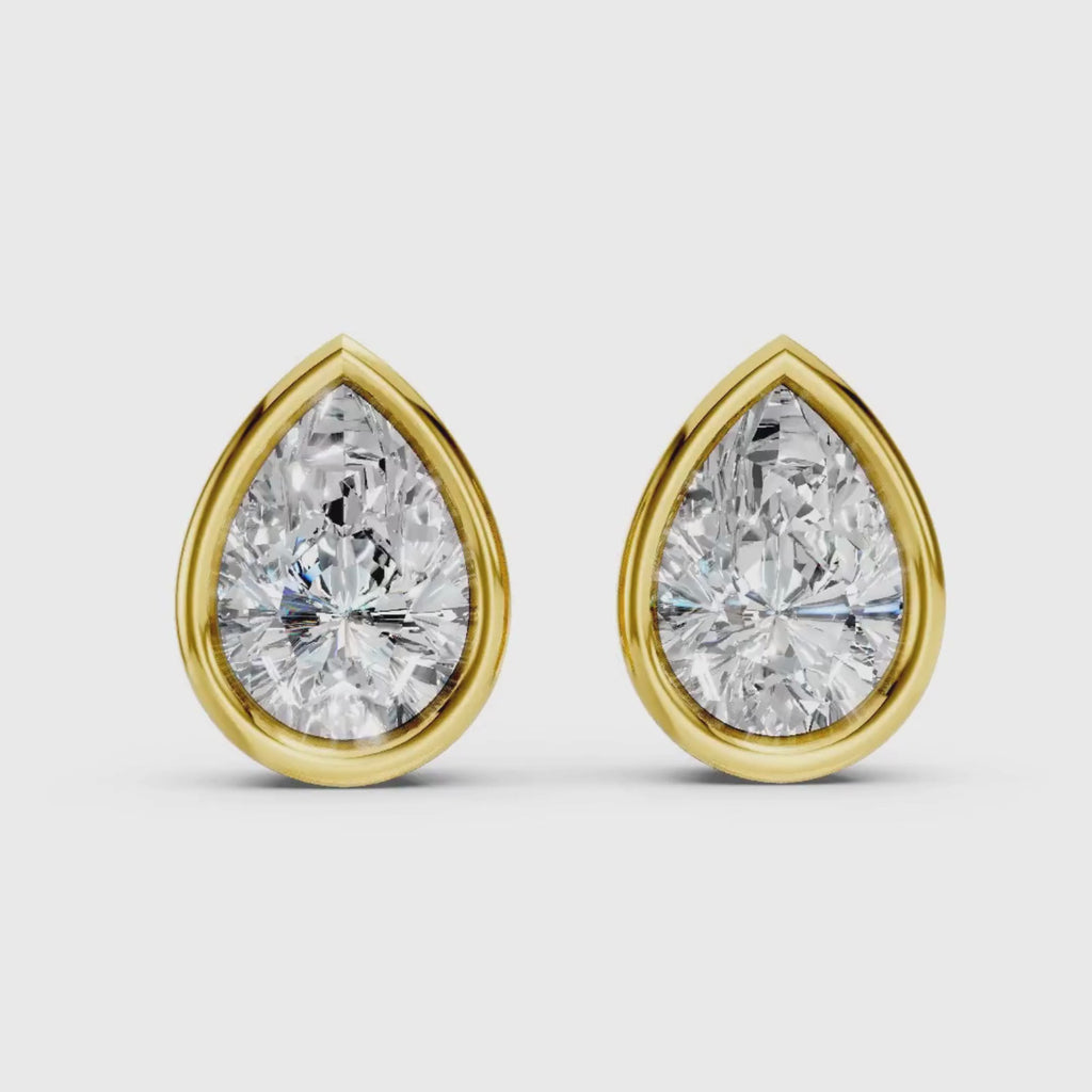 1.00 - 2.00 Carat T.W. Pear-cut Lab Grown Diamond (F/VS+) 14K Gold Bezel set Stud Earrings with Double Notch Post & Pushback