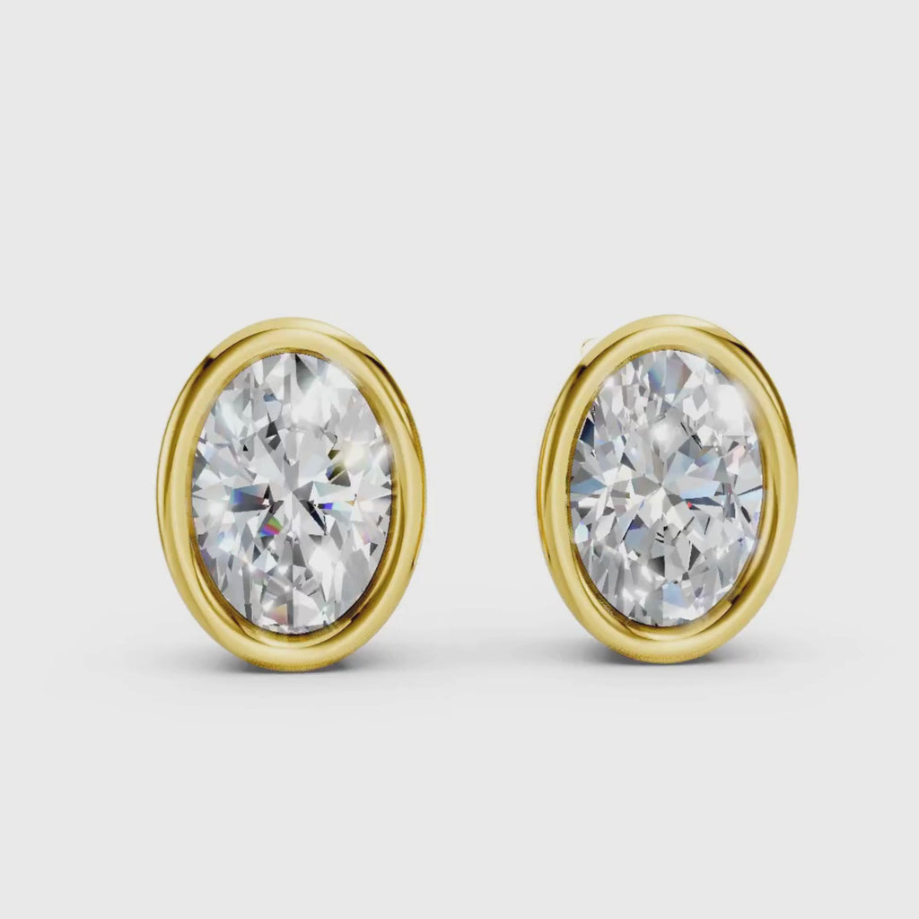 1.00 - 2.00 Carat T.W. Oval-cut Lab Grown Diamond (F/VS+) 14K Gold Bezel set Stud Earrings with Double Notch Post & Pushback