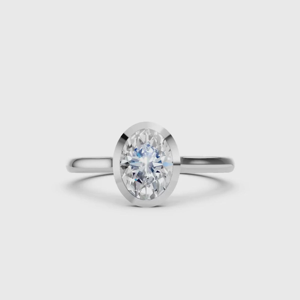 1.00-6.00 Carat T.W. Oval-cut IGI Certified Lab Grown Diamond (F/VS+) 14K Gold Bezel Set Ring