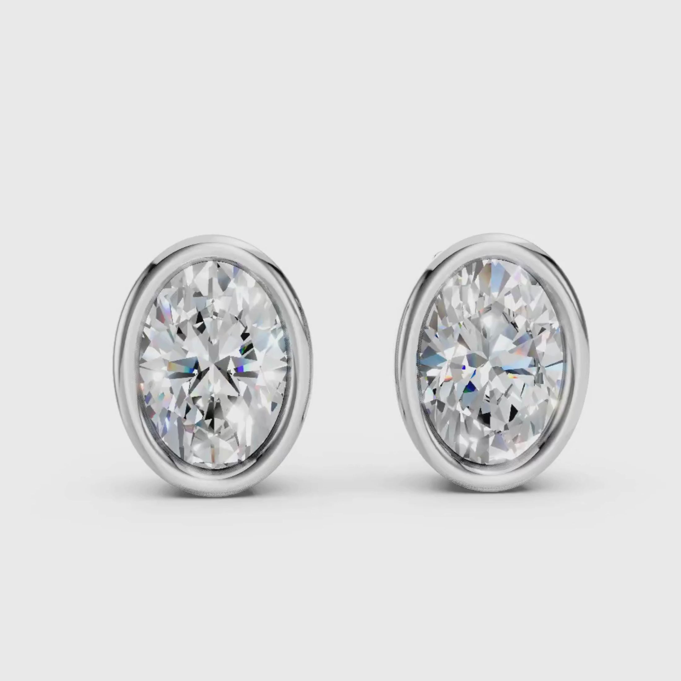 1.00 - 2.00 Carat T.W. Oval-cut Lab Grown Diamond (F/VS+) 14K Gold Bezel set Stud Earrings with Double Notch Post & Pushback